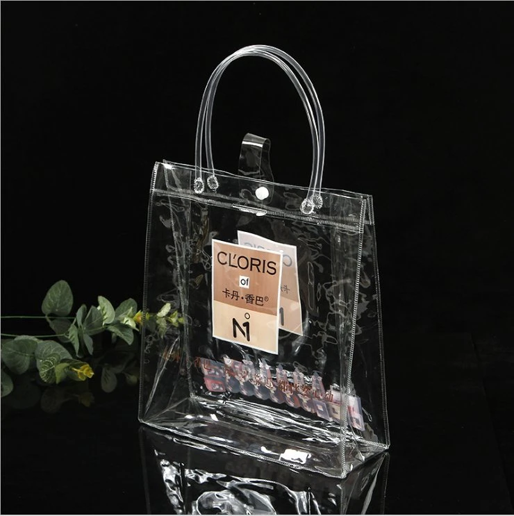 Sac transparent en PVC avec poignée imprimée et logo, idéal pour les cadeaux, les courses, les vêtements et les produits cosmétiques.