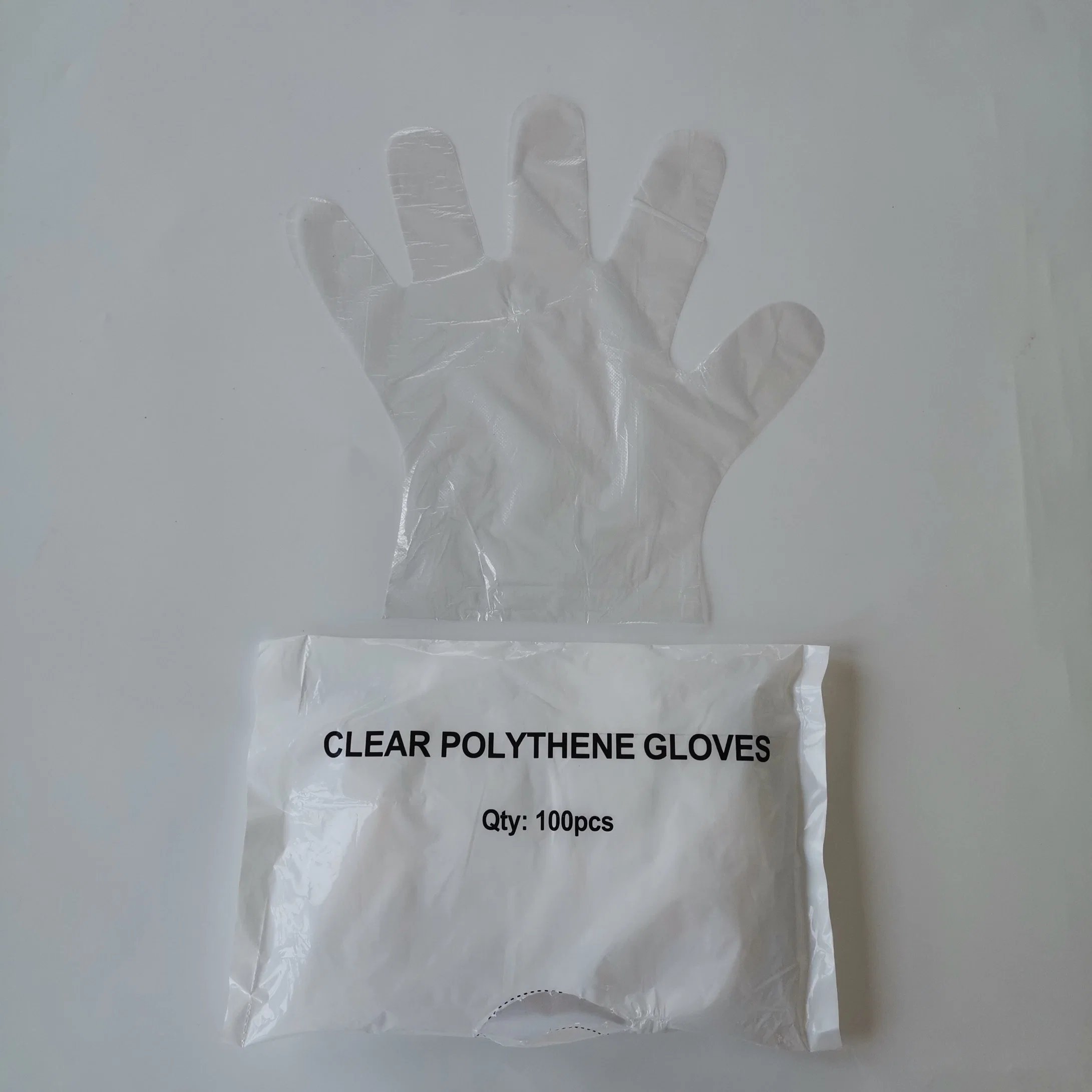 26*29 0.7g Transparent 100PCS Per Pack 100packs Per Carton HDPE Plastic PE Glove with Hang Hole Disposable Plastic Gloves with Printing