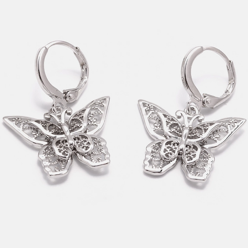 Beaux papillons Boucles d'oreilles pendantes en laiton avec zircone cubique