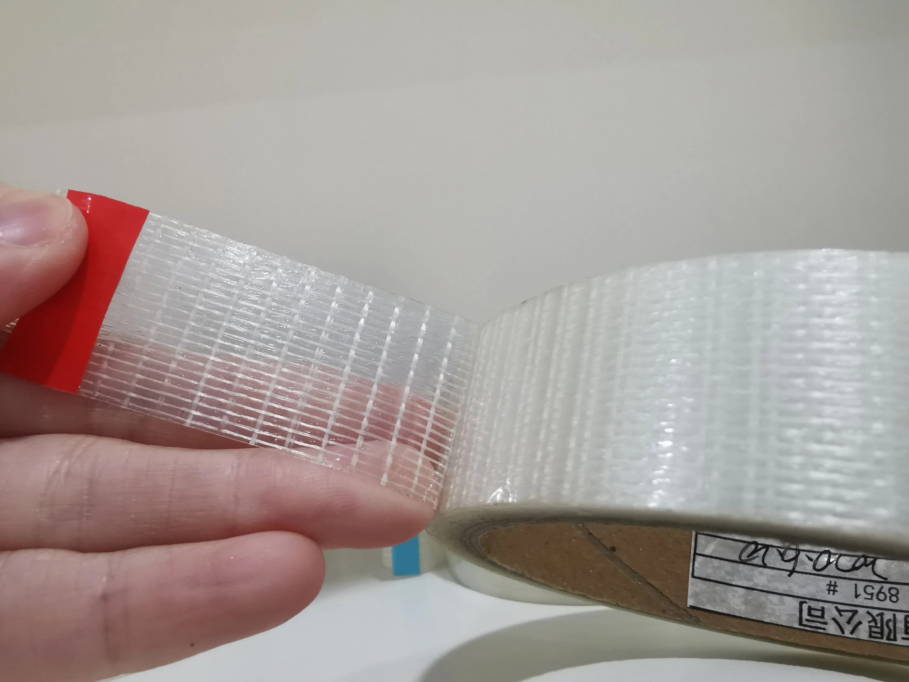 Tejido de malla de fibra de vidrio resistente resistente al agua alcalina de cinta de malla ignífuga de cinta de malla de fibra de vidrio.