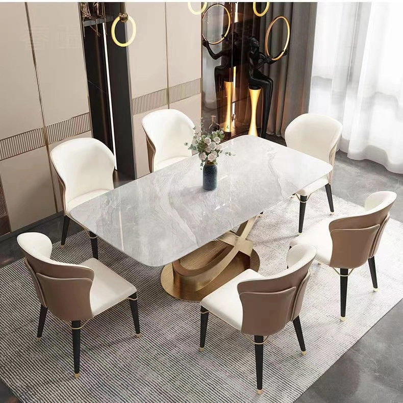 طاولة عصرية فخمة لتناول الطعام من الرخام الذهبي مع كرسي من الفولاذ المقاوم للصدأ قاعدة فولاذية