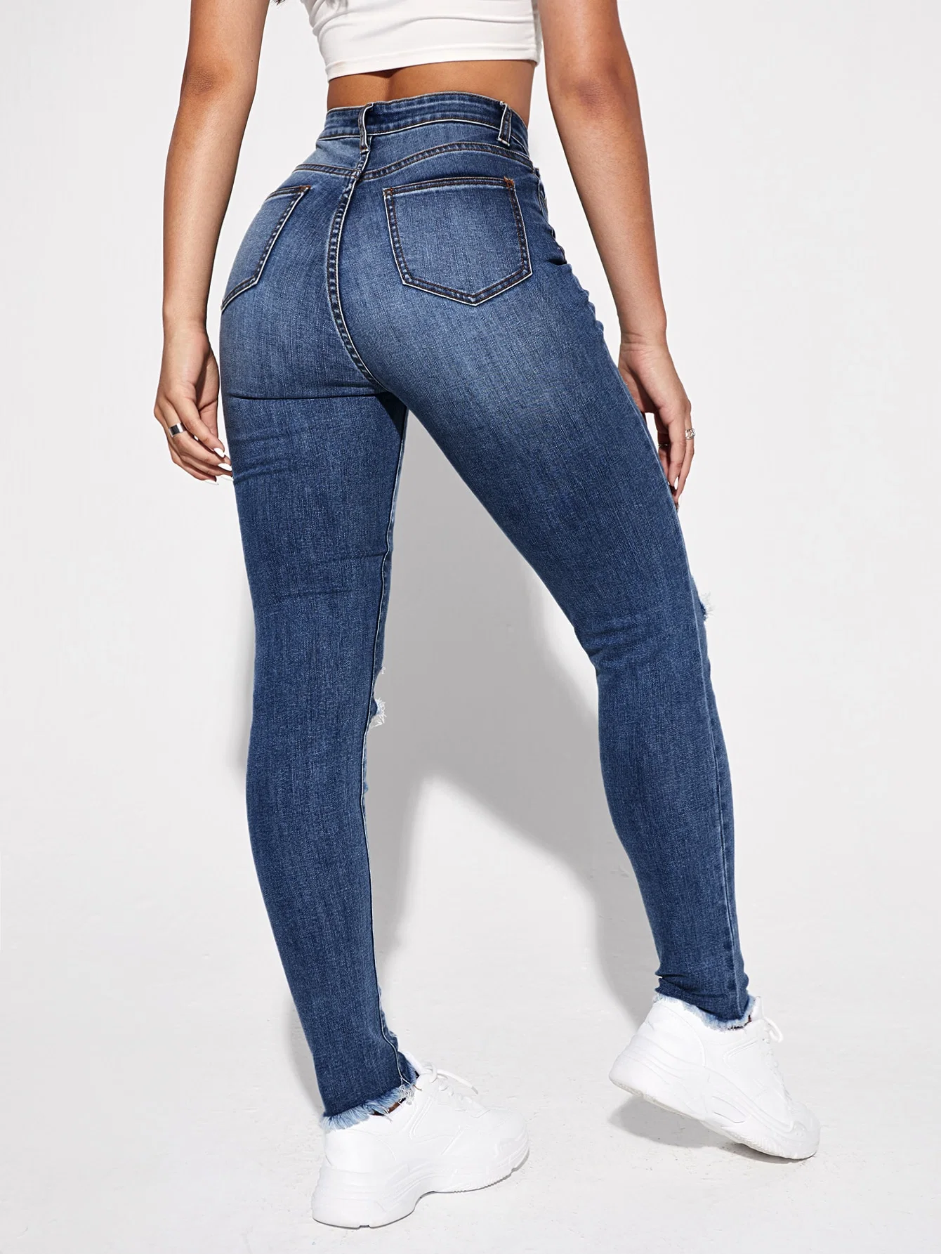 New Fashion Lady Jeans High Waisted Scratch Holes and Raw Edge Bottom Hem Stretch Quality OEM&ODM Slim Fitting Jeans