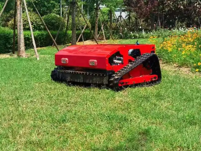 Véhicule à chenilles en caoutchouc de l'essence du robot automoteur Jardin tondeuse à gazon de commande à distance pour la vente