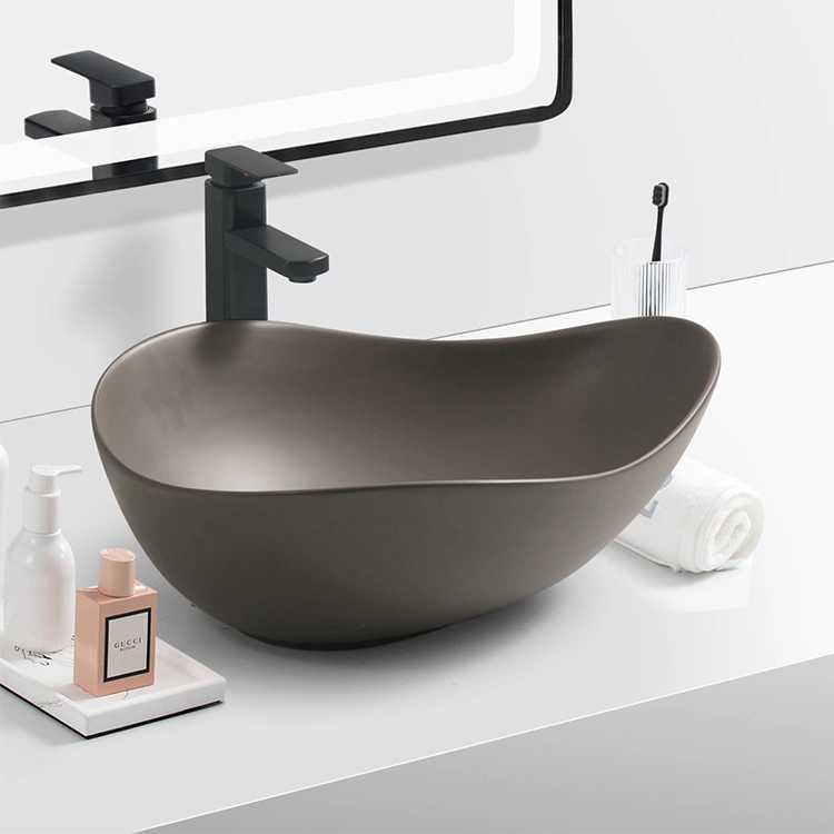 Chaozhou New Design High quality/High cost performance  Modern Oval Ceramic Art Wash Basin Above Counter Bathroom Sink