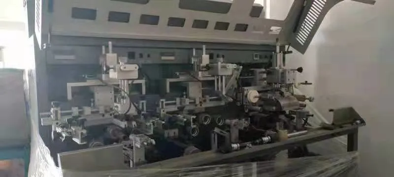 Sx-107 Fully Automatic Chain-Type Multicolor Screen Printing Equipment Equipped with Kinds of Functions Such as Automatic Loading and Unloading