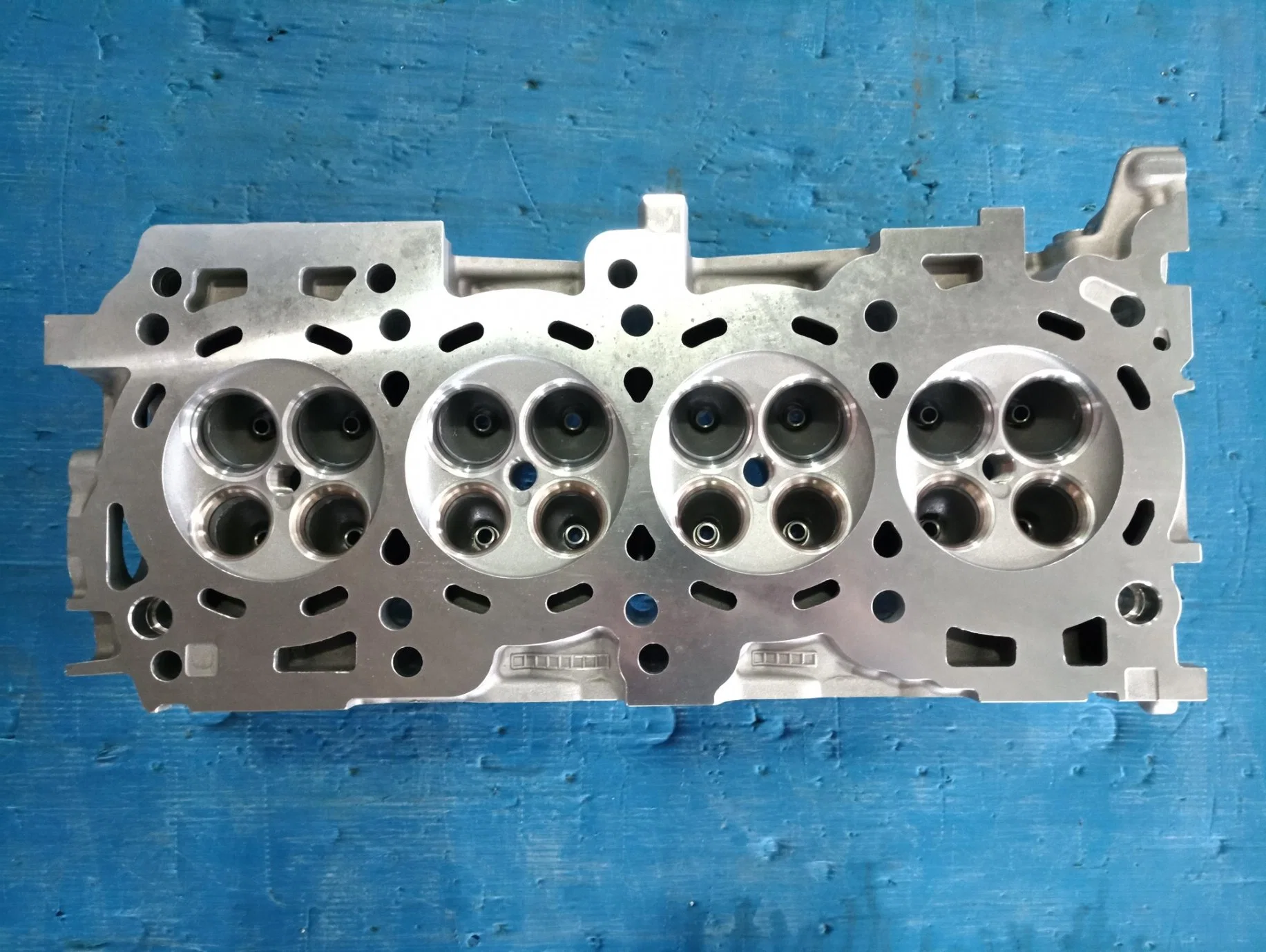 Milexuan Auto Engine Part Cast Iron Auto Accessories Qr25 Qr20 Cylinder Head 110405X00A for Nissan Cabstar Np300 Pickup (D22) 2.5dci