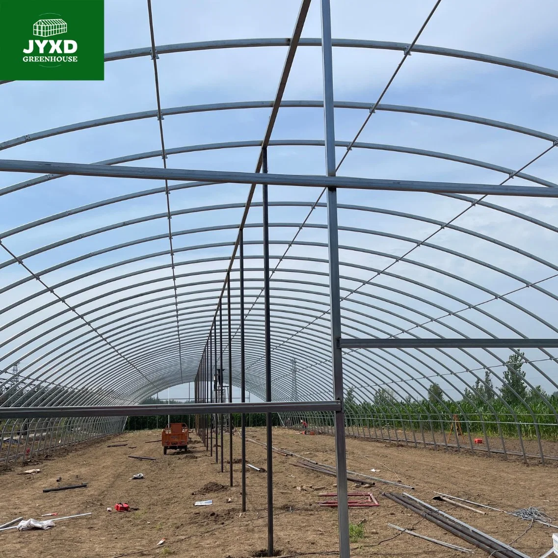 Agricultura moderna Multi-Span tubo oval personalizado Greenhouse con sistema hidropónico Sistema de calentamiento de Verduras Frutas Flores Lechuga Pimienta