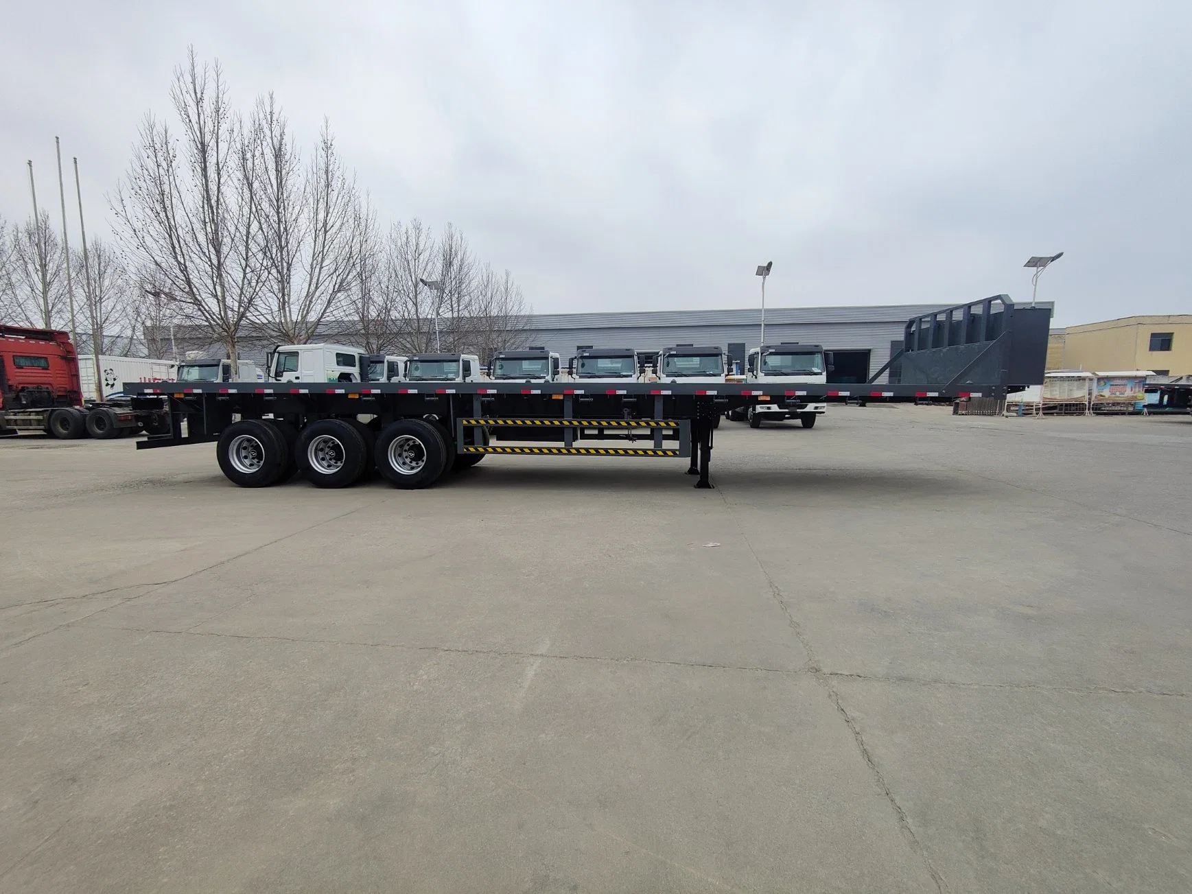 3/Tri Axles 60 Tons 20/40 Foot FT Container Flatbed Trailer