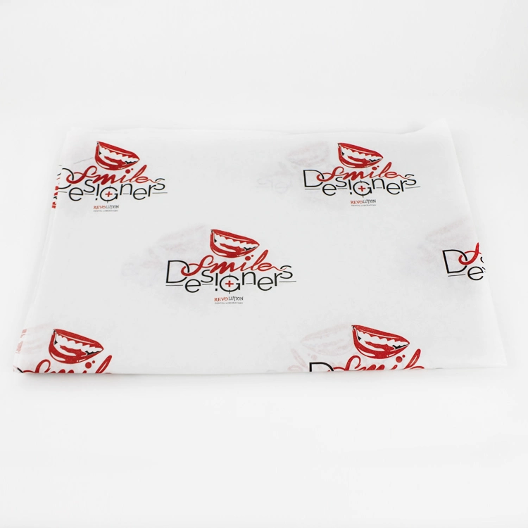 Emballage personnalisé en papier de soie pour cadeau avec logo personnalisé pour l'expédition.