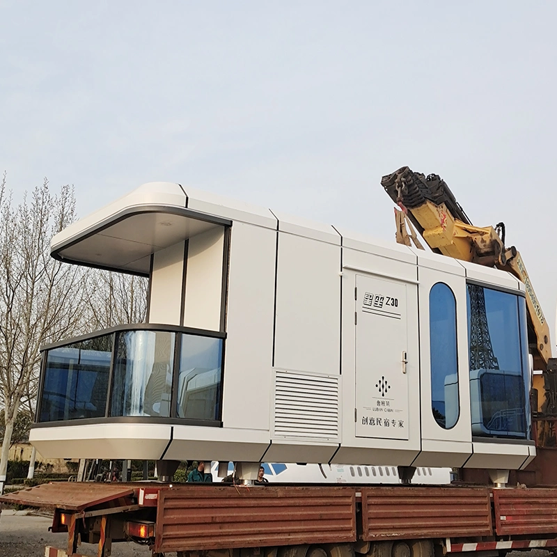 Venta al por mayor de modernos hoteles espaciales prefabricados en forma de cápsula móvil Tiny Apple Cabin Home House para la venta