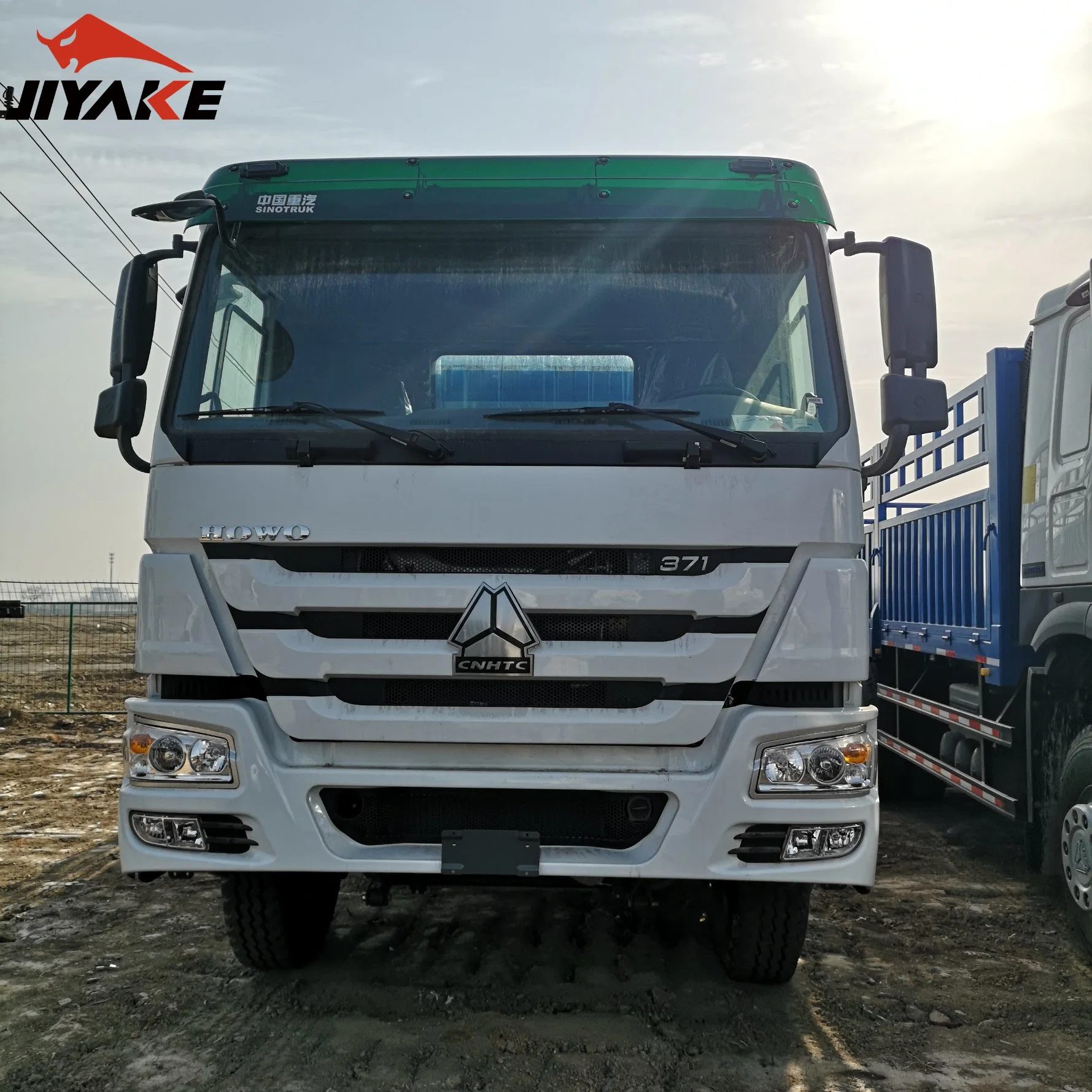 Used HOWO 371HP 10 Wheels 150 Cubic Meters Capacity Box 50 Tonnes Sidewall Board Fence Dropside Fence General Cargo Truck with Full Trailer