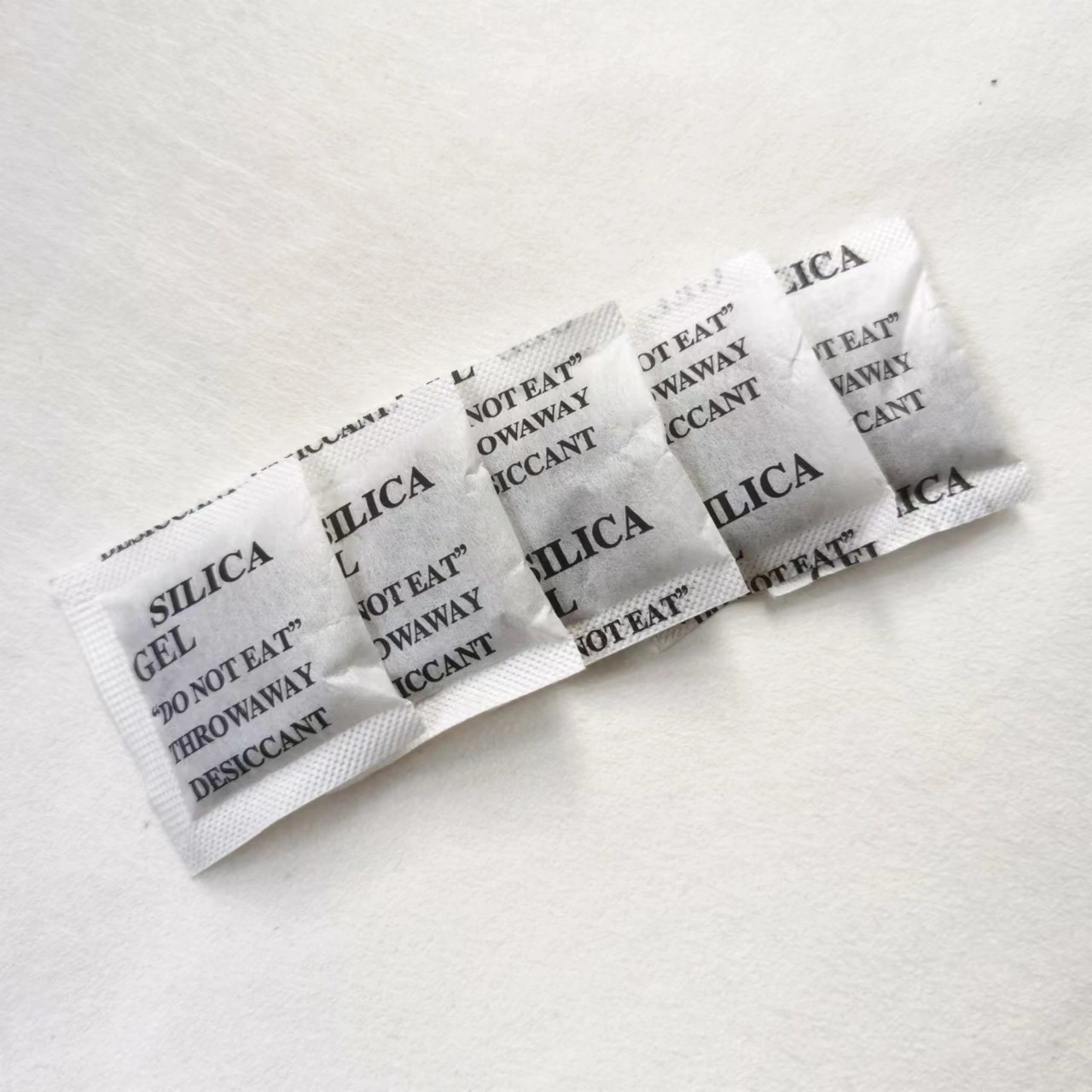 Anti-Mildew Activated Clay Desiccant Packet 5g in Non-Woven Paper for Food/Metal Parts Storage