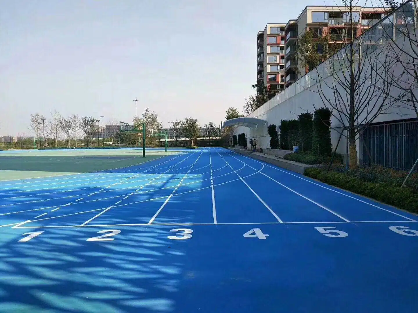 Tapis de course à pied en caoutchouc synthétique préfabriqué pour les stades sportifs internationaux