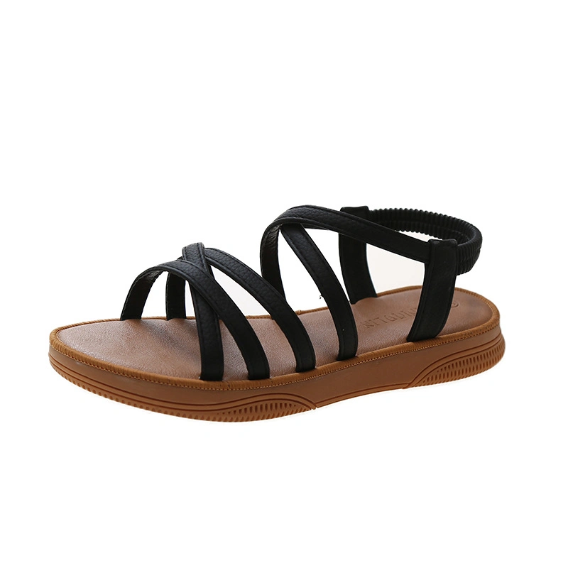 2023 Summer New Korean Version of Flat Sandals Female Elastic Strap Set Foot Cross Soft Sole Student Casual Sandals Wholesale/Supplier