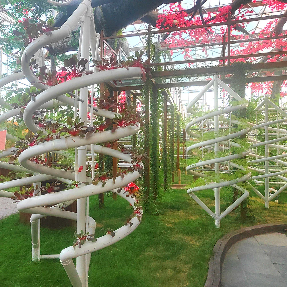 En el interior agrícola vertical del sistema de cultivo hidropónico Nft crecer canal para el jardín de flores de invernadero con caldera de calefacción y ventilador de refrigeración