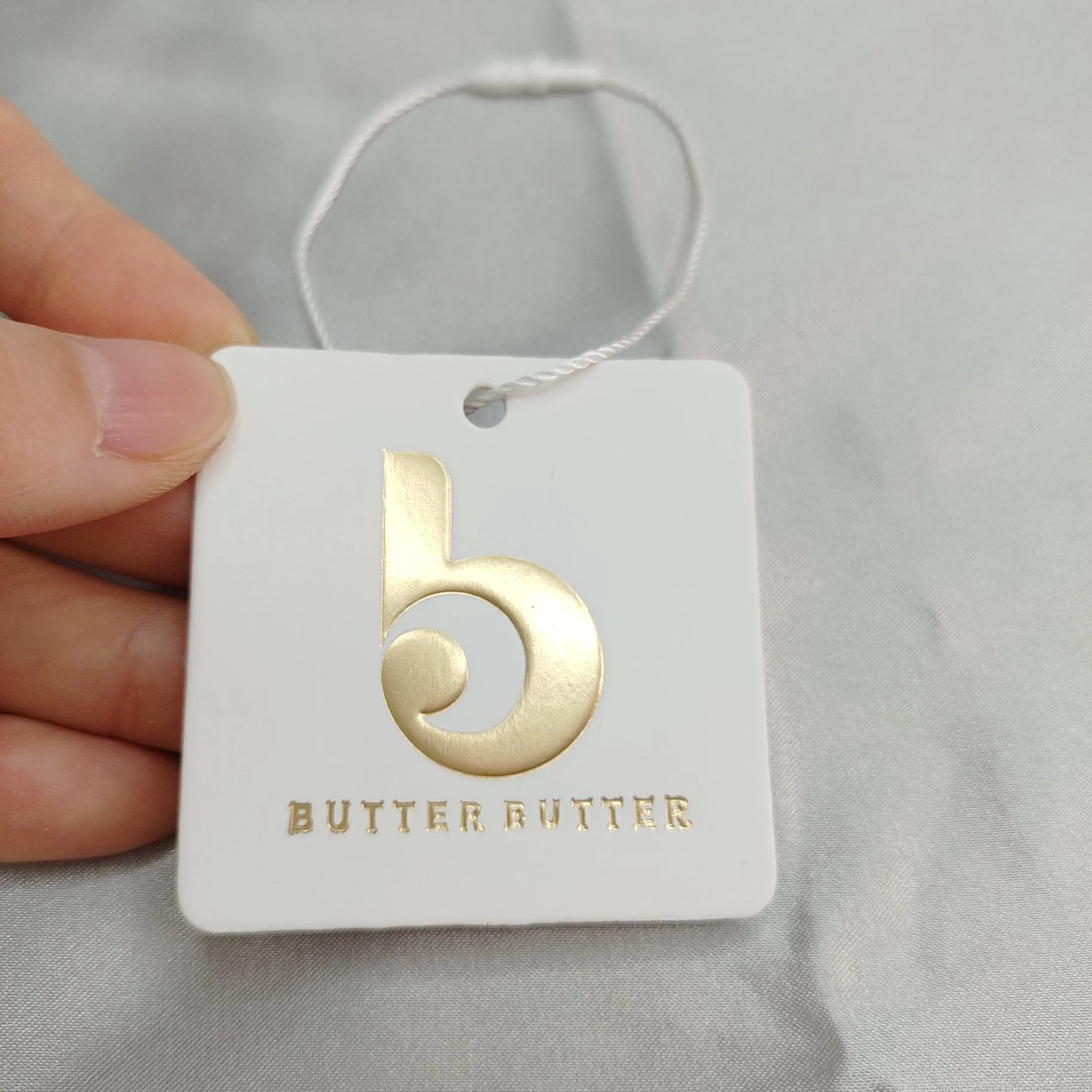 OEM Designer Hang Tag, Emboss with Gold Foil Semilucent Butter Paper Hang Tag Custom Luxury Hang Tag