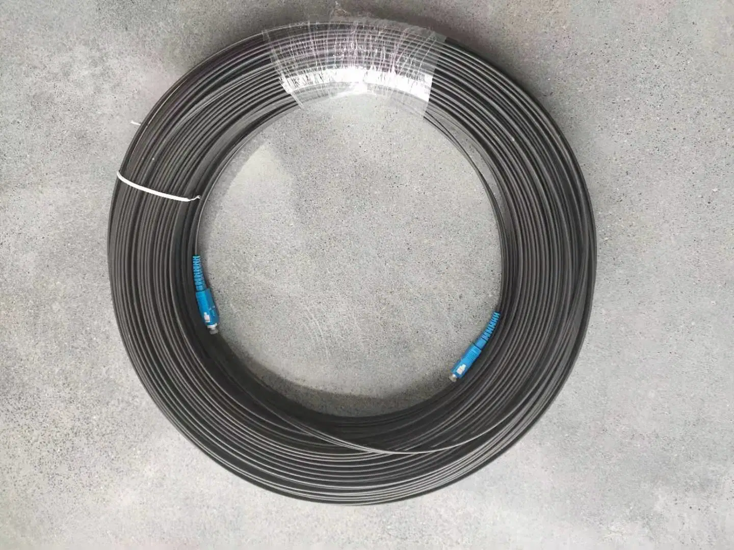 Upc, APC Ferrule Type FTTH Bow Type Drop Fiber Optic Patch Cord Sc APC Upc for Optical Fiber Communication