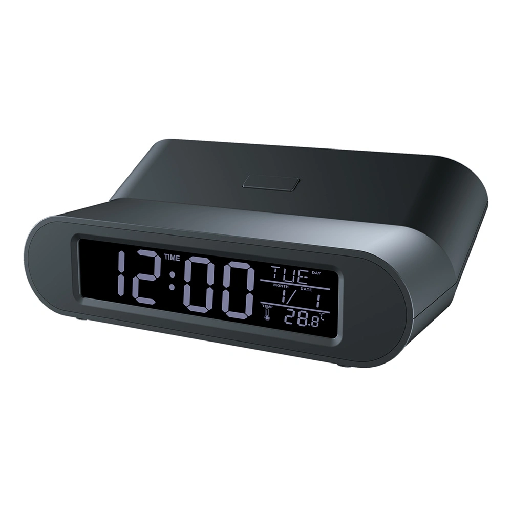 Réveil numérique avec lumière, horloge et thermomètre.