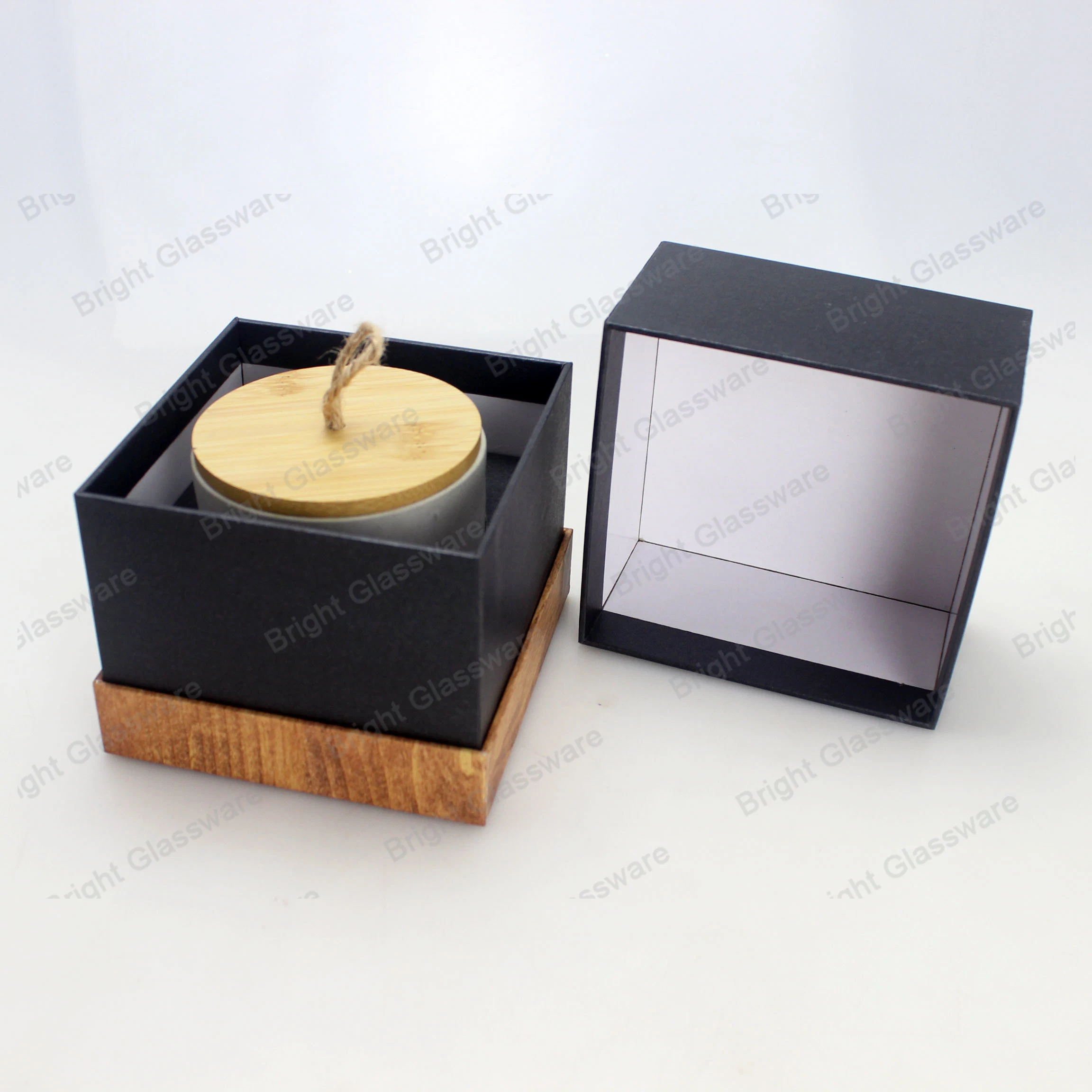 Caja de papel cuadrado negro con textura de madera inferior para frascos de cemento