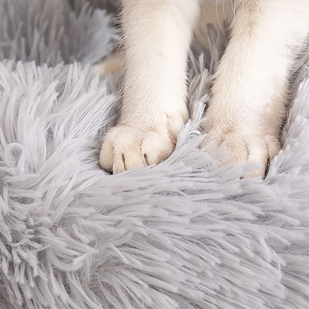 Cama de cachorro redonda reutilizável com formato de rosquinha antiderrapante.