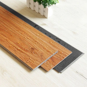 Foshan Factory Waterproof Spc Flooring Warm Color Wood Texture Plastic Vinyl Flooring