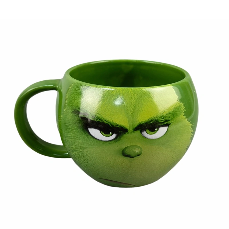 Navidad creativa la taza de café esculpida con cara de Santa de Grinch