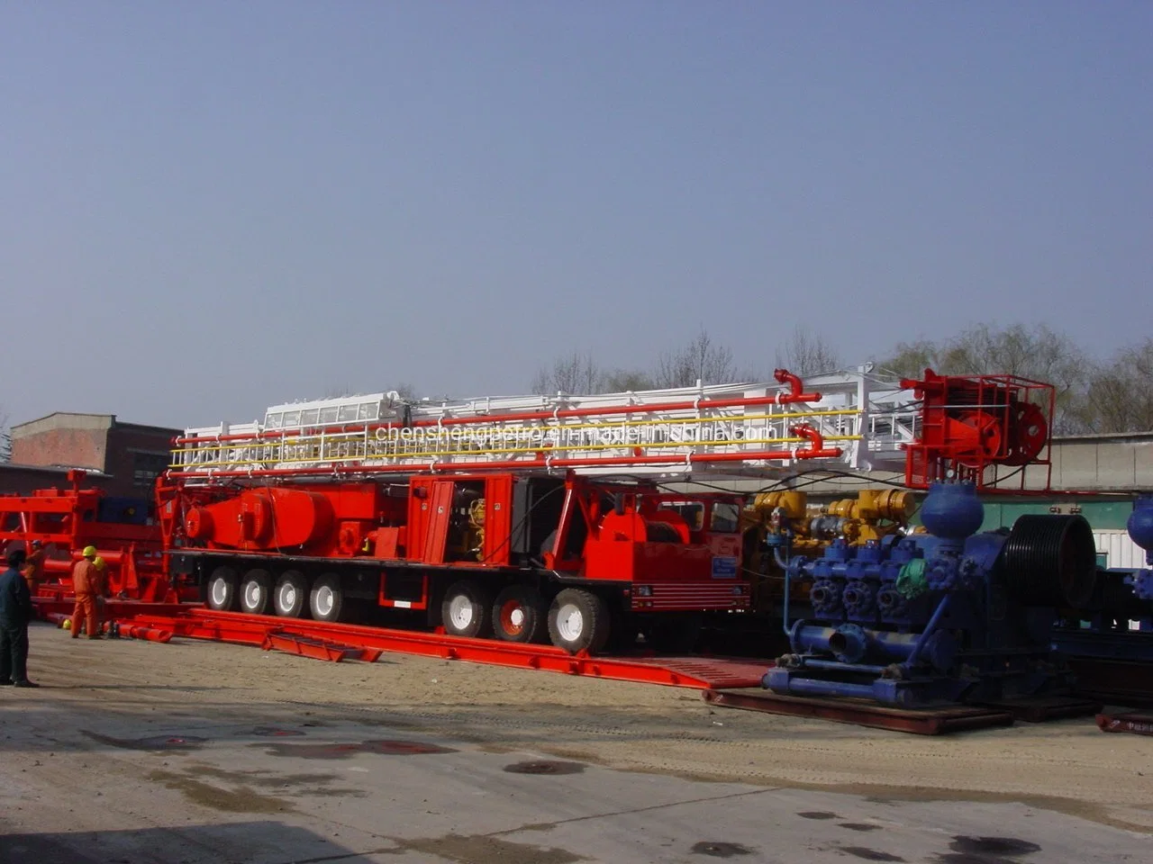 Zj30 Land Oil Drilling and Xj750 Workover Rig 130t 3000mtruck Mounted Drilling Rig Substructure Mud Tank Circulation System Zyt Petroleum Equipment