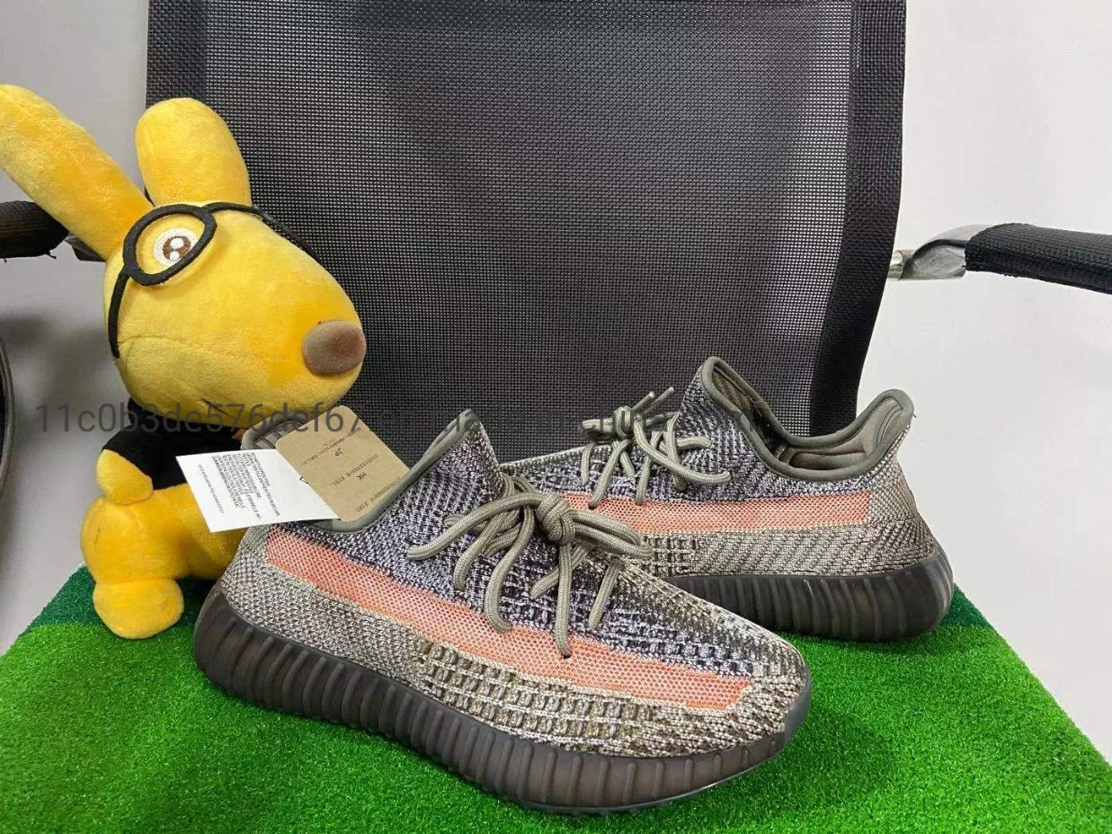 При работающем двигателе на заводе Putian кроссовки Кэйни Уэст Yeezy 350 500 700 фирменные кроссовки