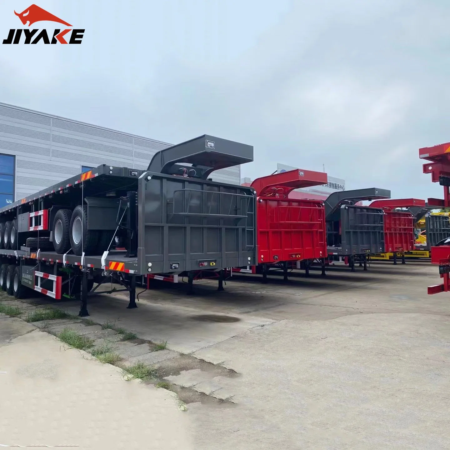 40 60 100 Ton Heavy Duty 3 Axle 4 Axle Low Flatbed Loader Deck Lowboy Trailers Lowbed Semi Trailer with Ramps