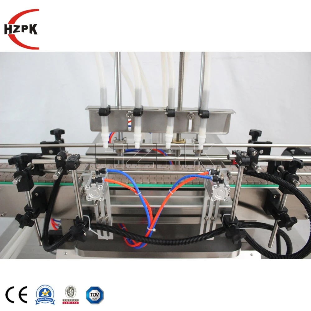 Loción Hzpk Máquina de Llenado de líquido de la Mesa de la máquina de llenado de botellas de bebidas máquina de llenado de llenado de la máquina de llenado de detergente Máquina de Llenado
