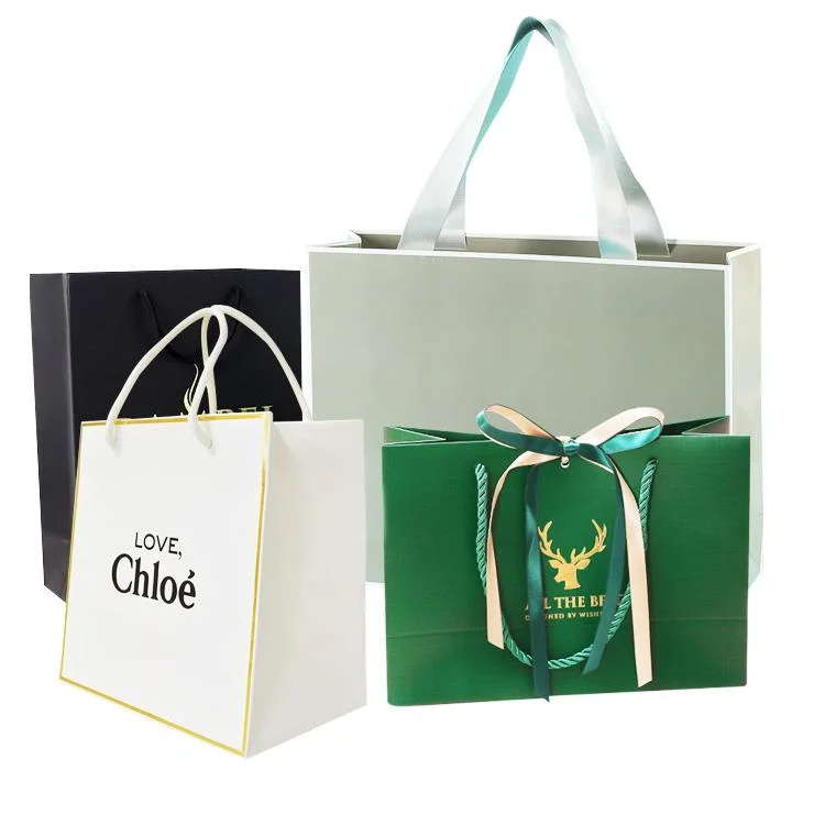 Bolsa de embalaje marca el logotipo de rosa de oro blanco de papel cartón de embalaje Compras Bolsas de regalos para el vestido estampado de lámina con el propio logotipo