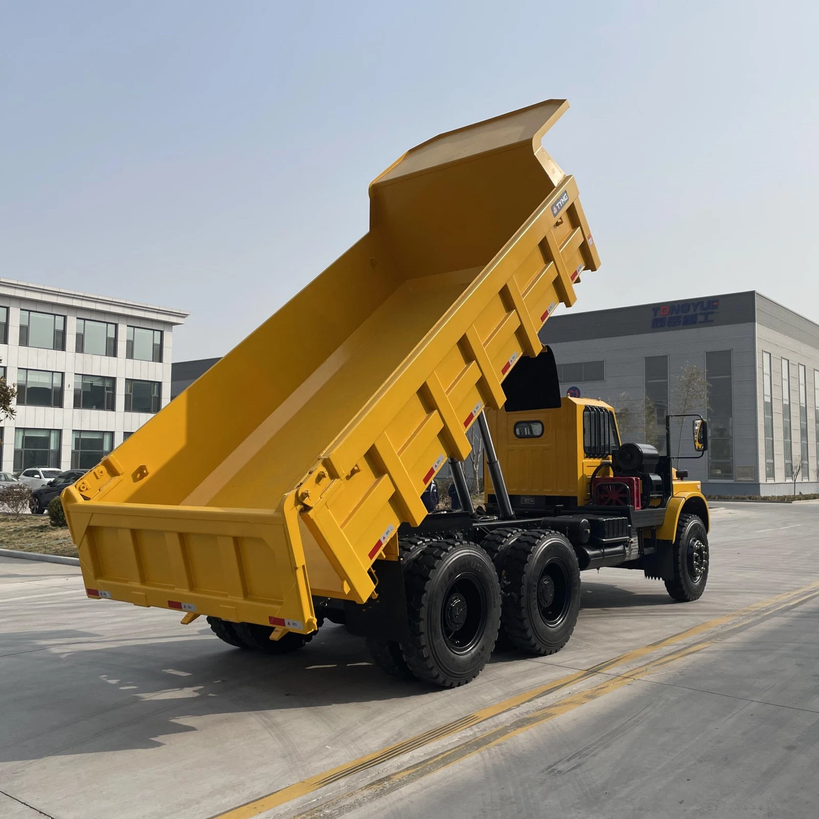 Powerful 10-Wheel Dump Truck for Transporting Heavy Loads in Mining Environments