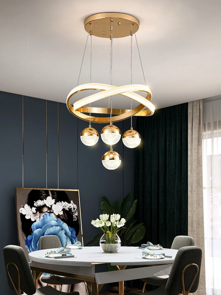 Salle à manger de luxe de lumière lustre concepteur d'éclairage de l'Art moderne et minimaliste Three-Head Nordic chambre à coucher salle à manger de la Table ronde poignée de commande de la lampe à LED