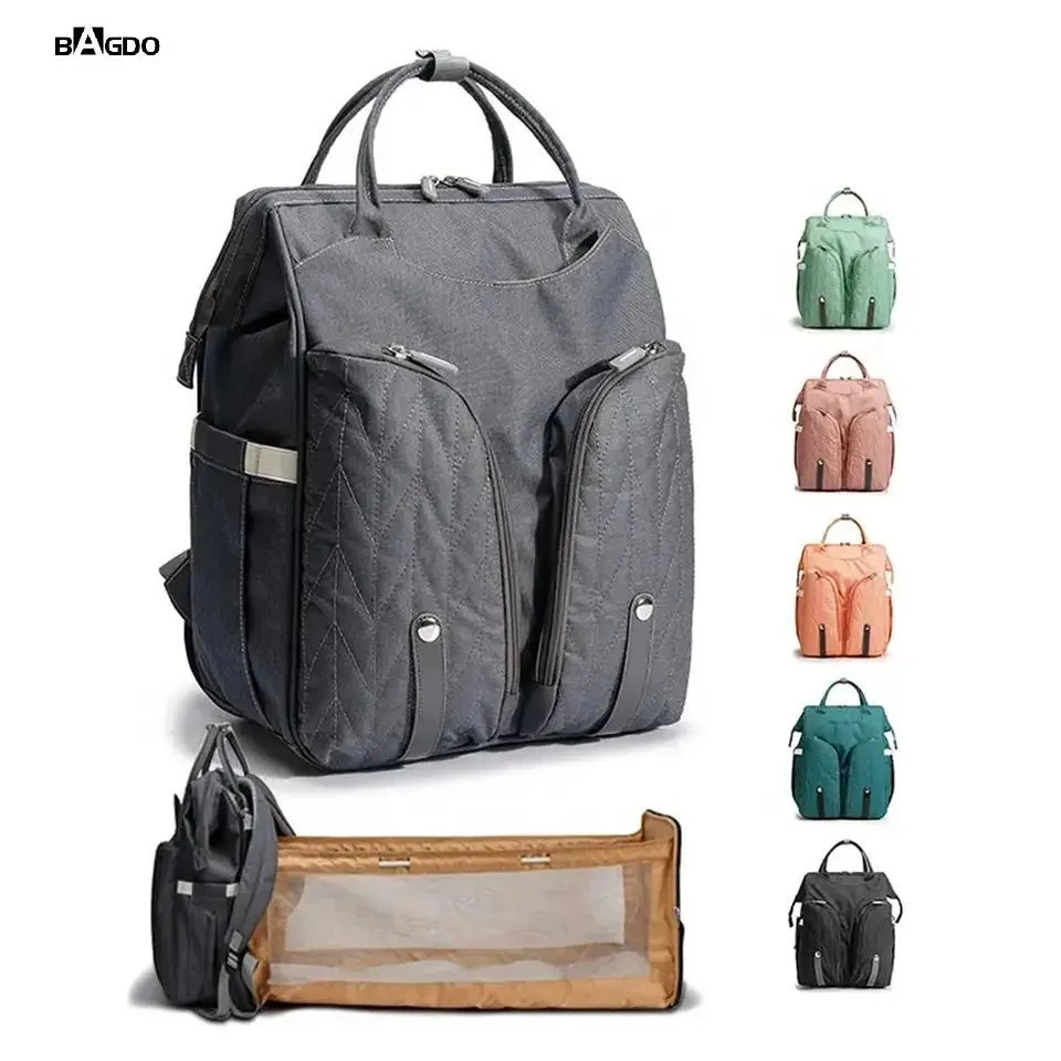 Factory Wholesale/Supplier Custom portátil impermeable Mochila Mochila plegable cama de bebé Bolsa de pañal con estación de cambio