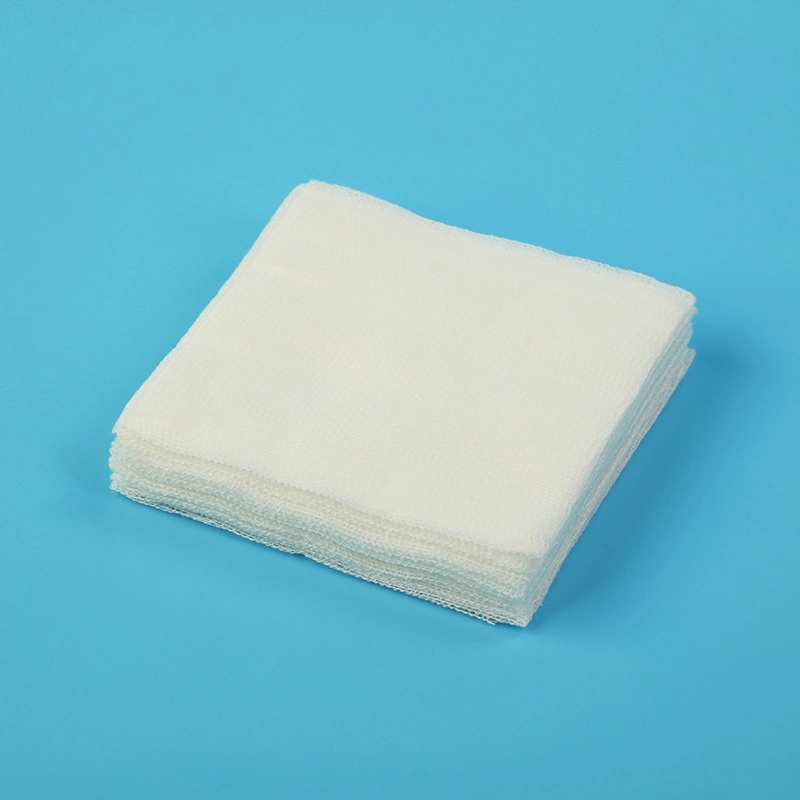 OEM Absorbent 100% Cotton Compressed Absorb Fluids Gauze Roll for Hospital Clinics