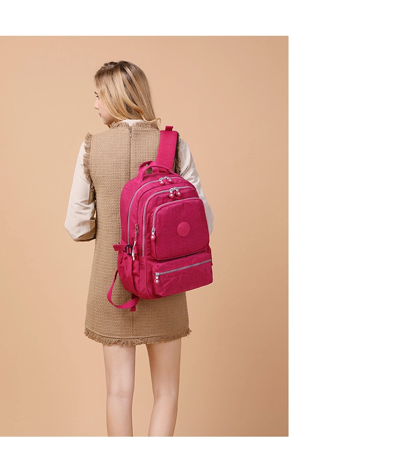 Mochila de estudiante Nylon impermeable Gran capacidad elegante simple ordenador ligero Bolsa