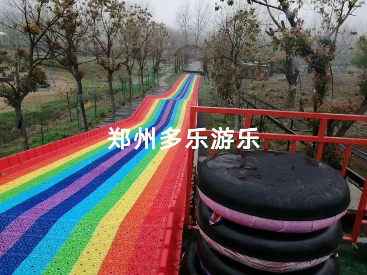 China Supply Outdoor Playground Plastic Dry Ski Rainbow Snow Slip Slide Fun Park Equipment for Amusement Park