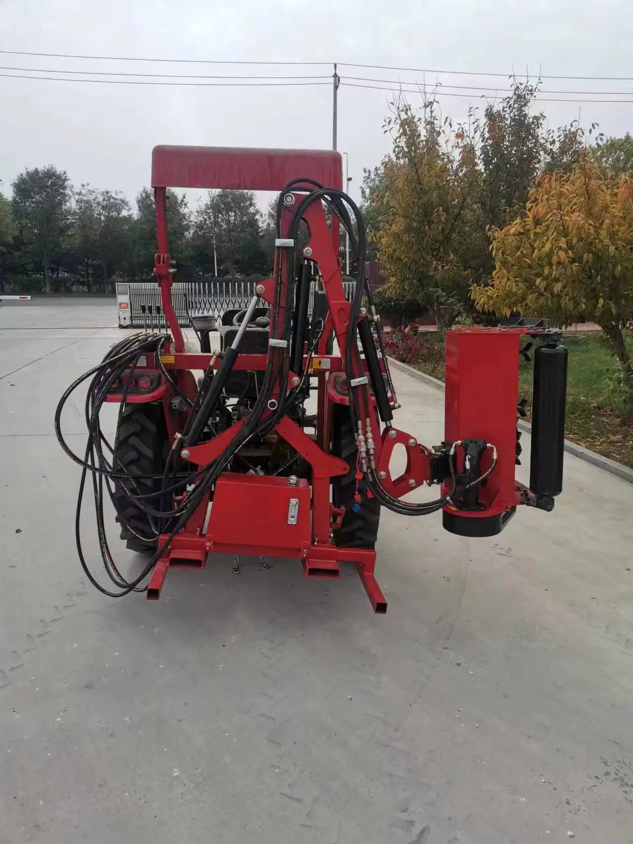 Tractor Provides Power to Drive Gear Pump to Drive Hydraulic Operated Cantilever Lawn Mower