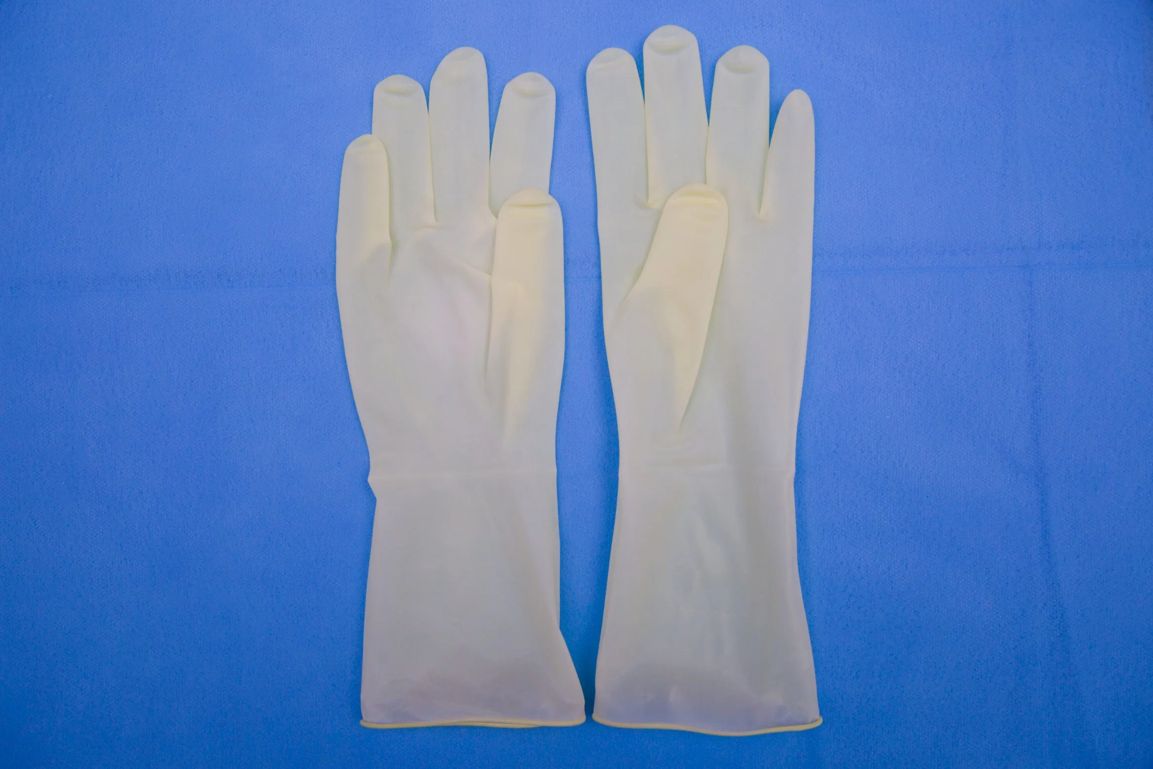 Gants de latex médicaux jetables en latex stériles gant chirurgical en poudre