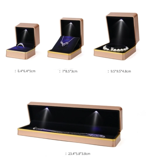 Caja de regalo de plástico de gama alta de color dorado con LED Luz interior Negro Velvet espuma de almacenamiento de almacenamiento de envases al por mayor Zhuhai OEM buena calidad Precio bajo