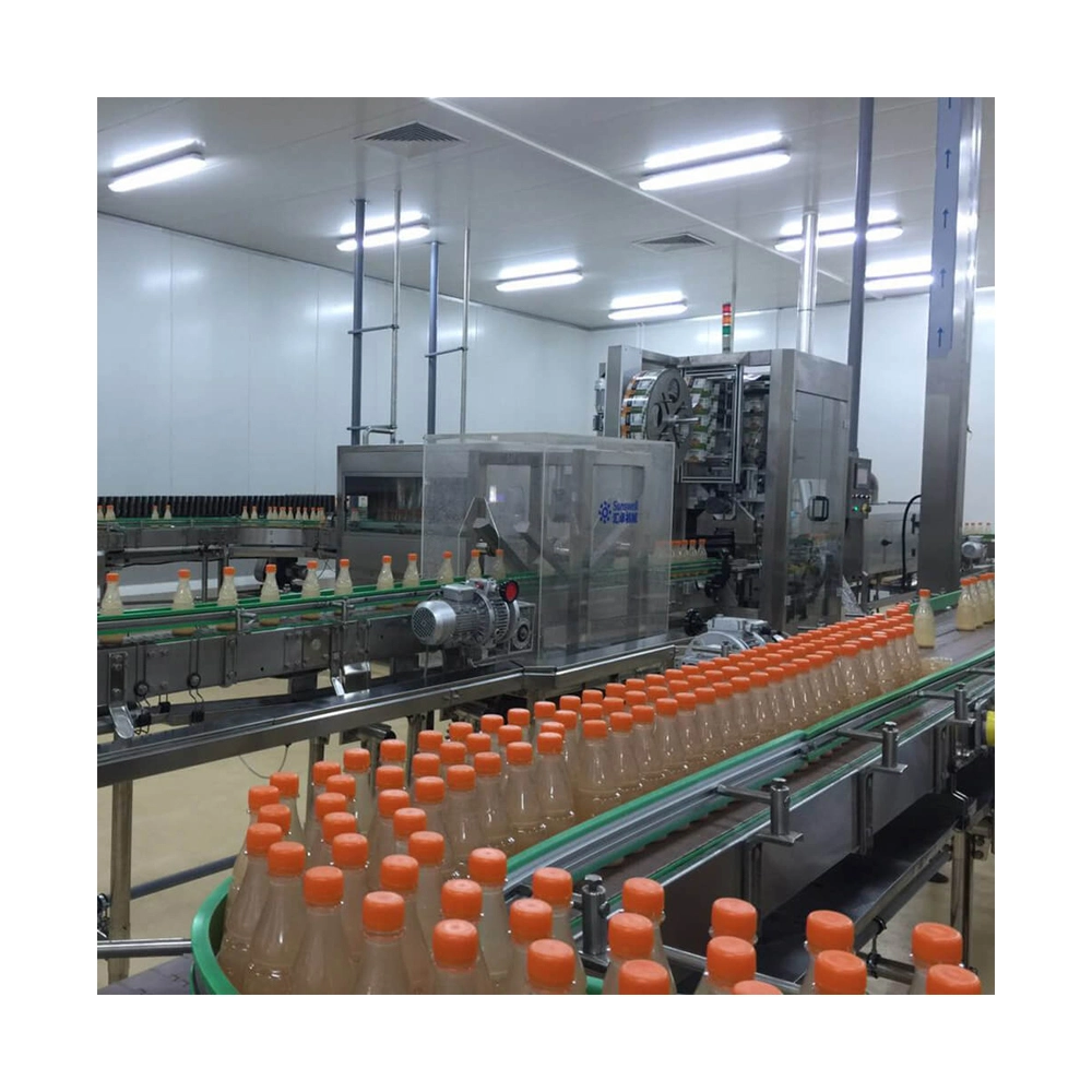 Máquina de llenado y embotellado de bebidas líquidas en botellas de PET de 500 ml y 1L de alta velocidad automática de Zhangjiagang. Línea de producción de agua purificada, agua mineral natural, jugo y bebidas refrescantes.