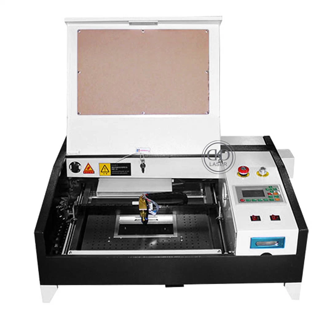 Mini máquina de grabado láser CNC para tienda de regalos Impresión haciendo grabado Madera Corte acrílico