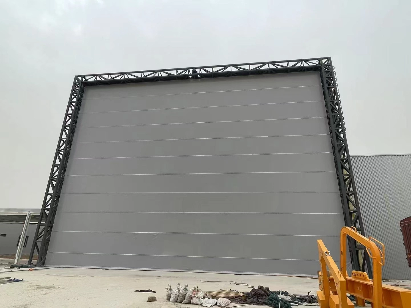 Industrial Automatic Steady China Cost Effictive Double PVC Fabric Steel Support Frame PVC Mega Hangar Door for Shipyard or Big Size Blast Painting Room