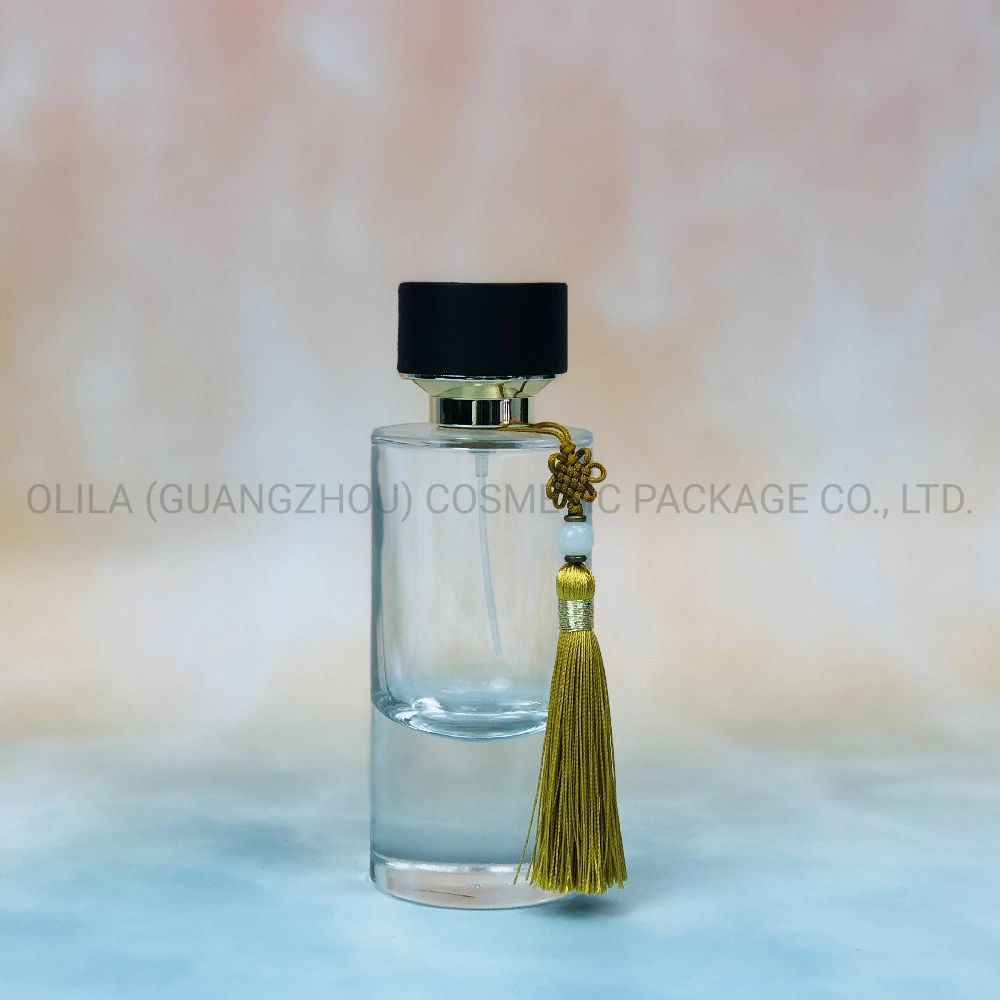 Wholesale/Supplier Perfume Bottle Glass 100ml Perfume Bottle Package with Tassels