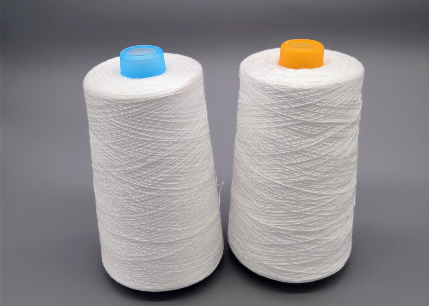 Polyester Thread Yarn 40/2 Micro Polyester Spun Yarn 20/2 Heat Set PP Sp 40/3 Sewing Thread Weaving Polyester Yarn 50/2