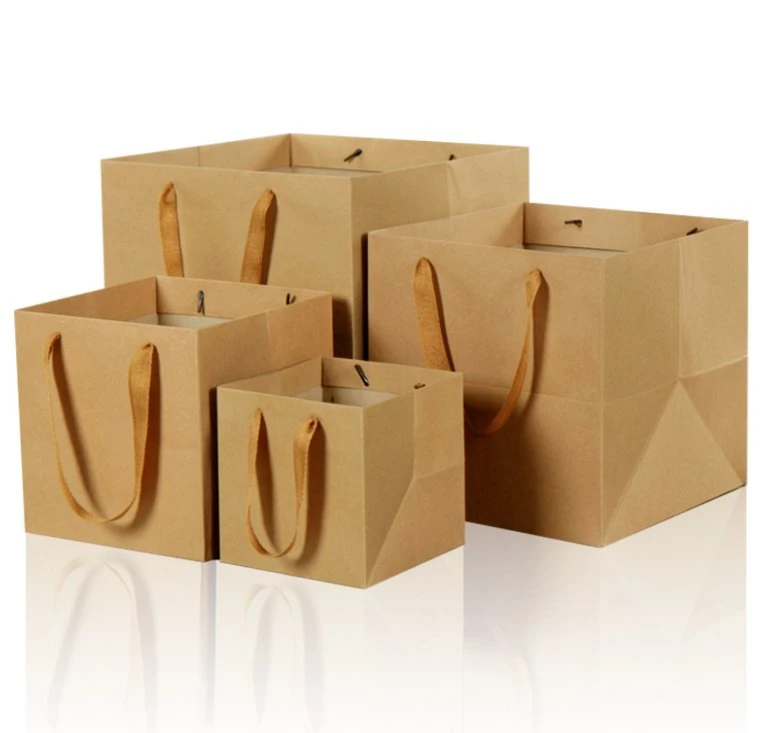 Bolsas de papel de embalaje con logotipo impreso personalizado de cartón blanco marrón Kraft, bolsas de regalo promocionales de lujo marrón reciclado para almacenamiento de arte, artesanía y compras