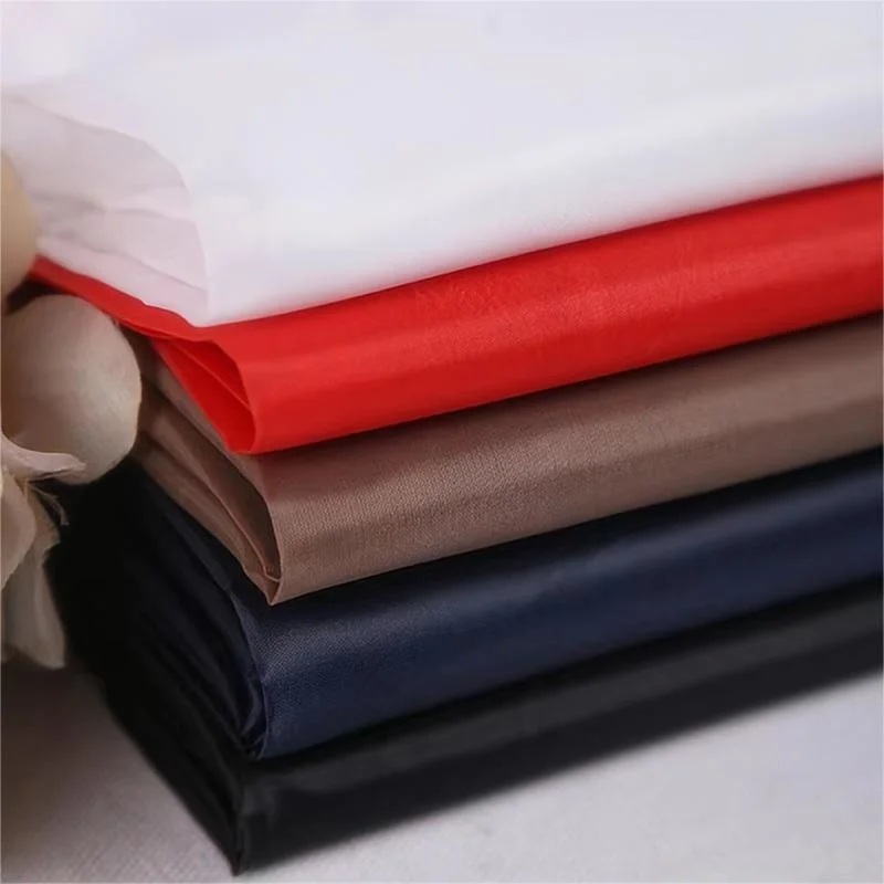 Wholesale/Supplier Factory Low Price 45g-62g 100% Polyester Taffeta Fabric Lining for Garment