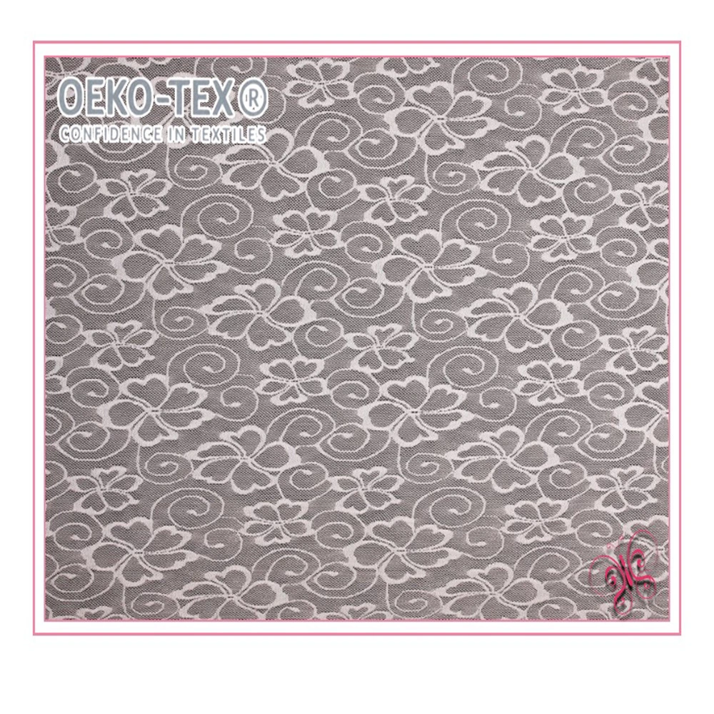 Fujian material textil de tela con motivos florales bordados 100% tejido de algodón