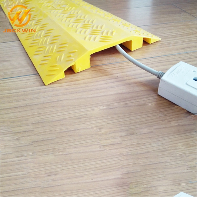 1 metro de color amarillo y un canal Protector de cable de piso plástico