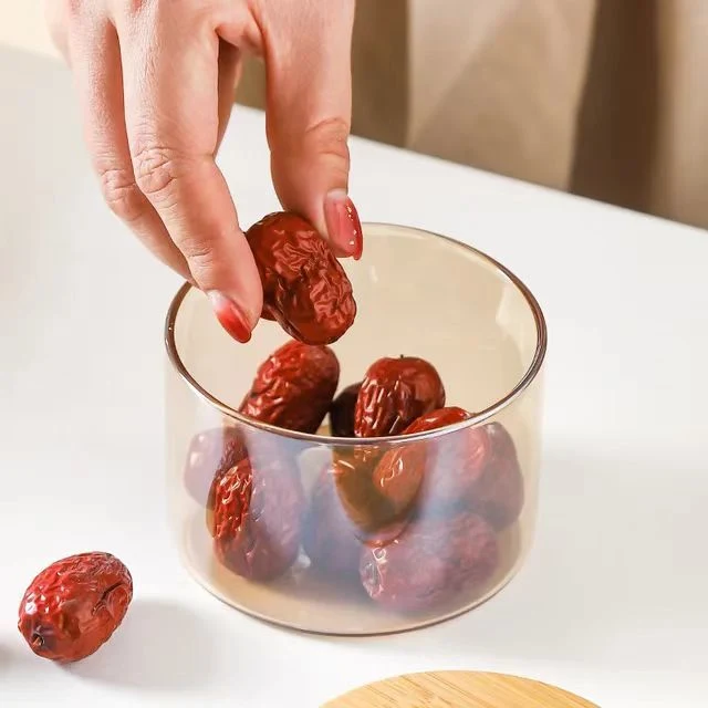 Ensemble de bocaux de rangement en verre borosilicate haut de gamme pour aliments et fruits avec couvercle en bambou pour la cuisine.